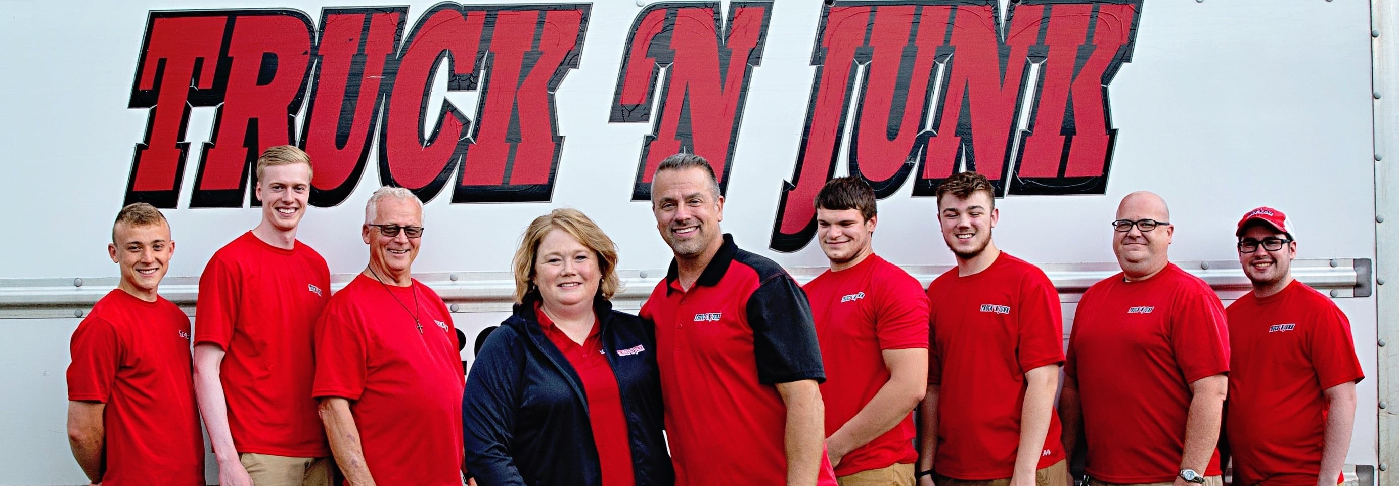 Truck`N Junk Removal Team in Front of Truck