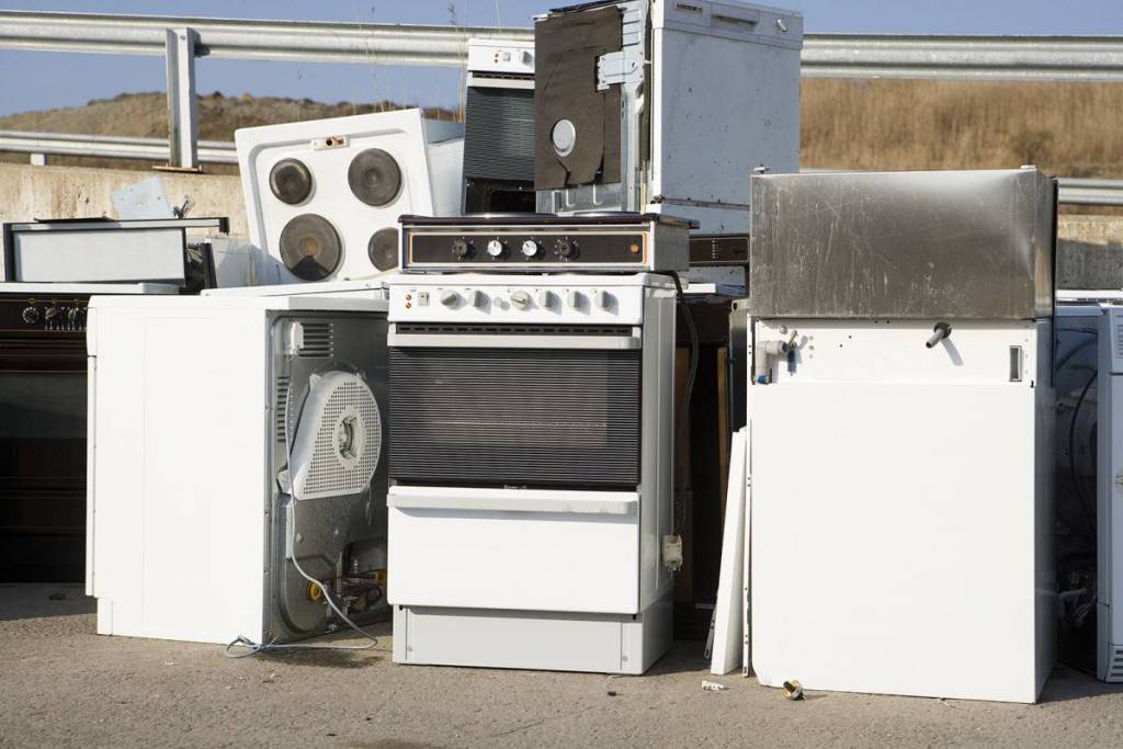 Old, unused appliances stacked up together