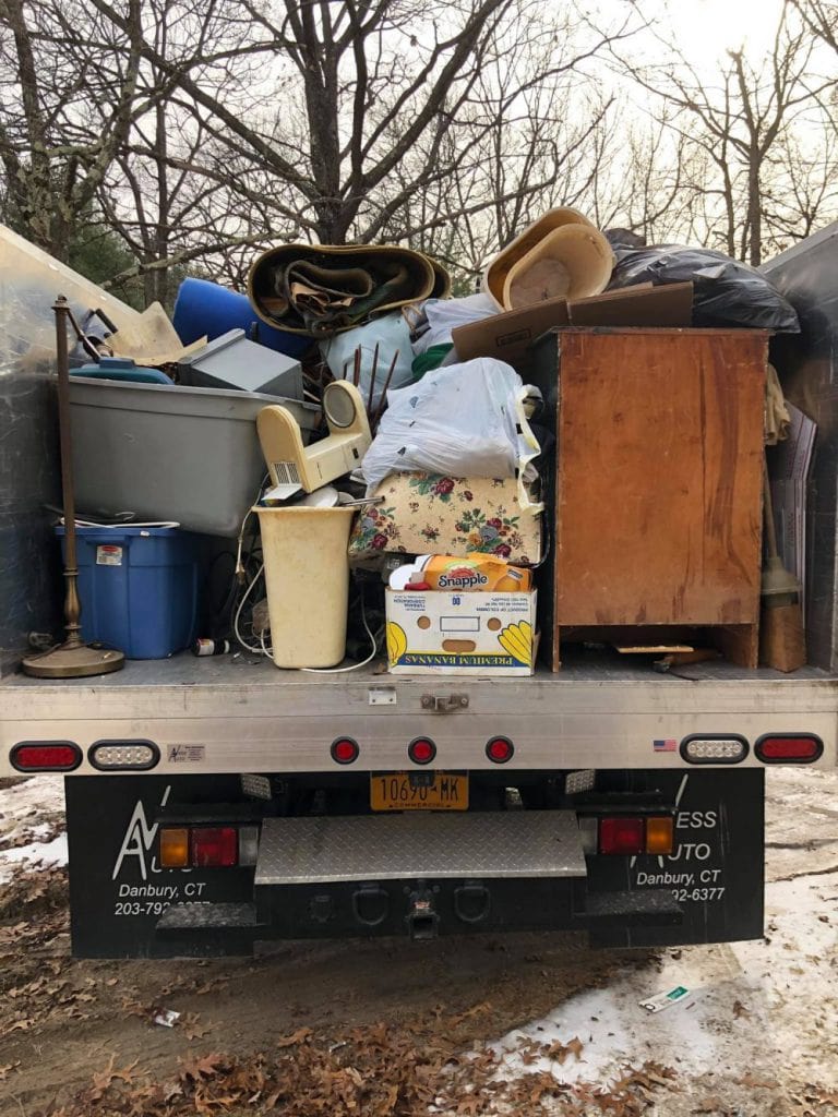 Junk removal truck full of junk