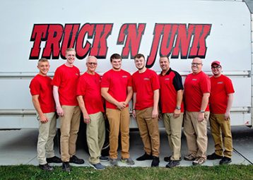 Truck N Junk employees in front of truck